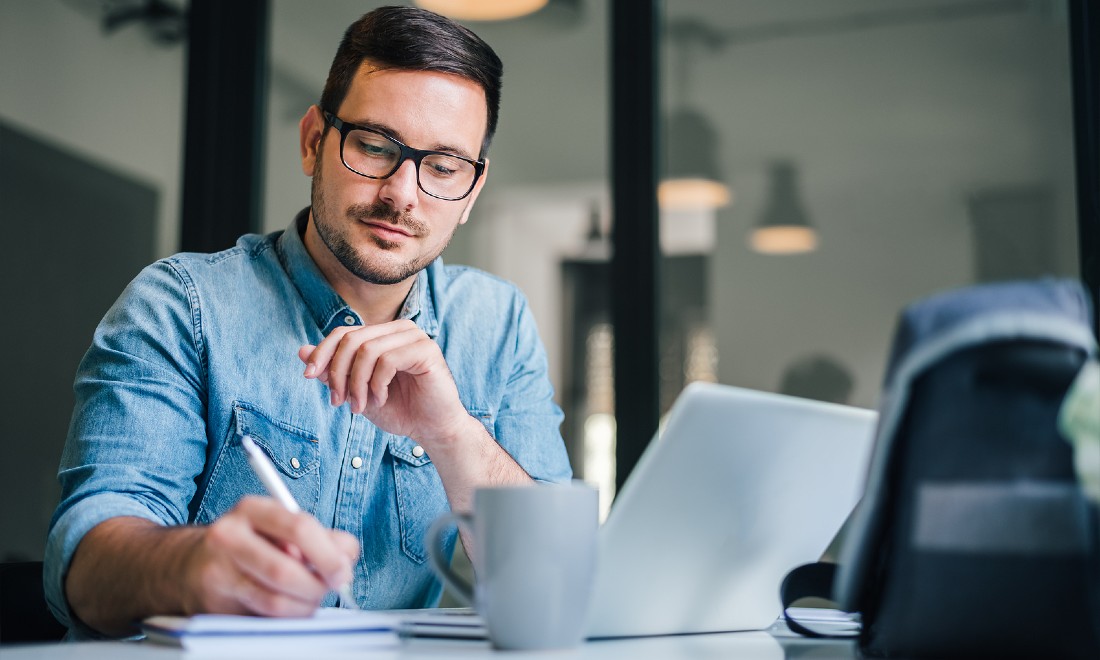 man working on laptop