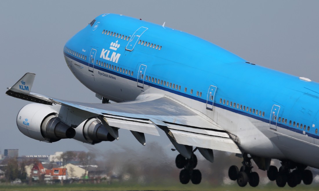 A KLM plane taking off at Schiphol Airport Amsterdam