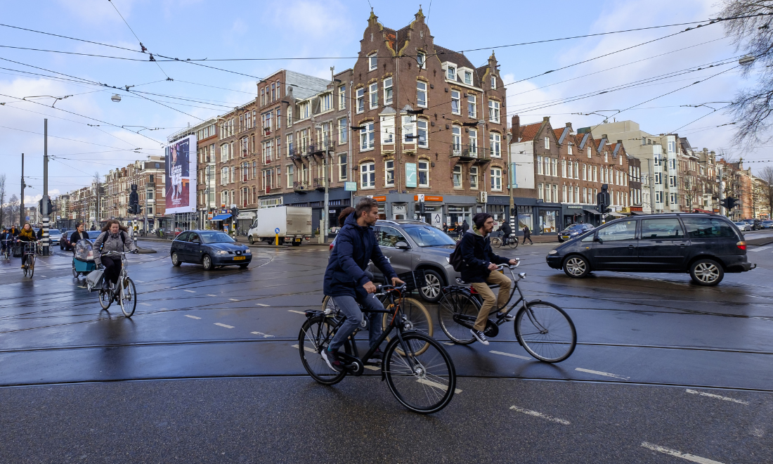 Cyclists and drivers in Amsterdam, the Netherlands