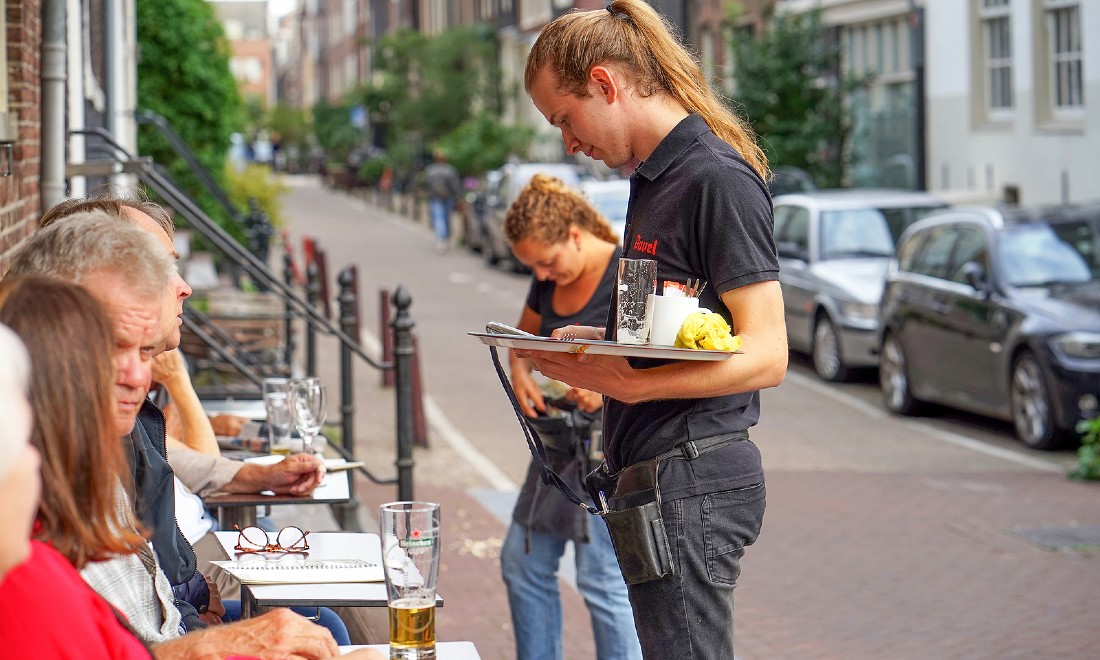 Waiter waitress bar cafe terrace Amsterdam the Netherlands