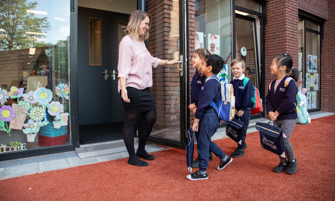 children and teacher at British School Amsterdam