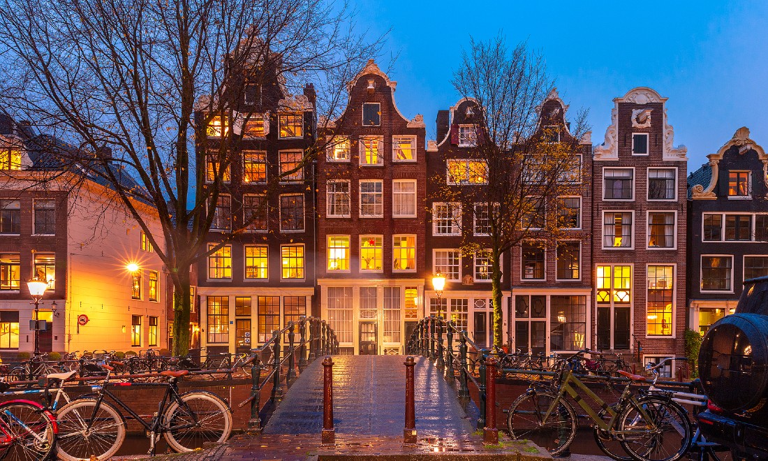 canal houses in amsterdam evening