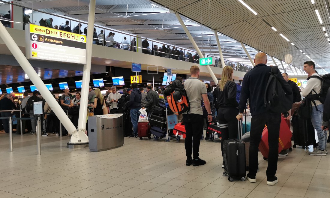 Schiphol Airport cancelled flights delays queues the Netherlands