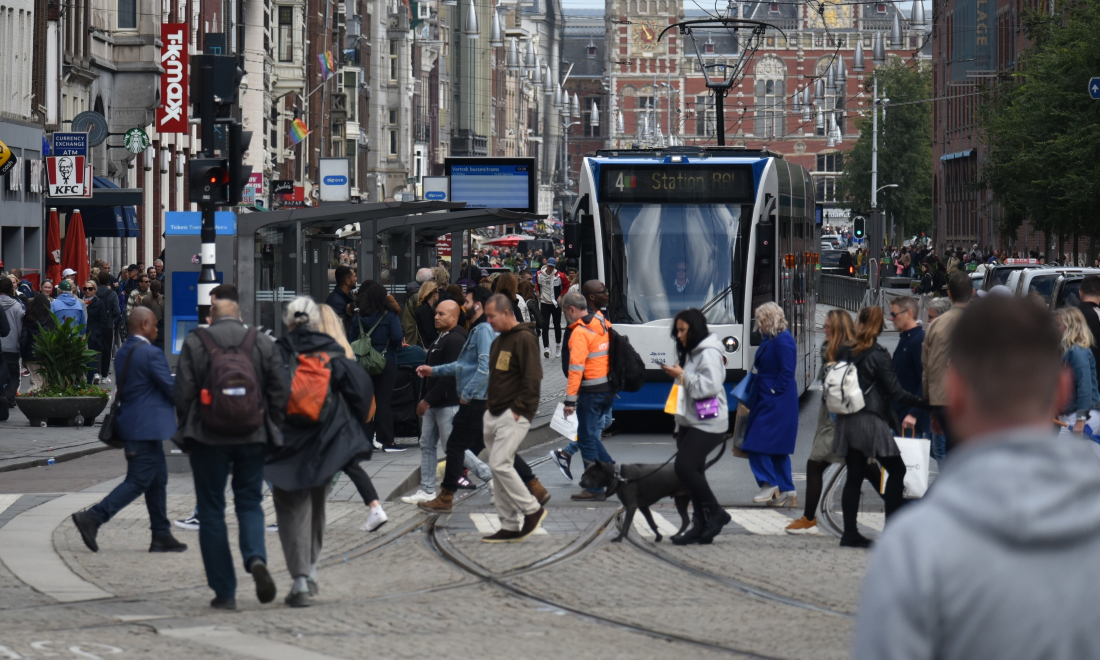 Shoppers on the Damrak in Amsterdam