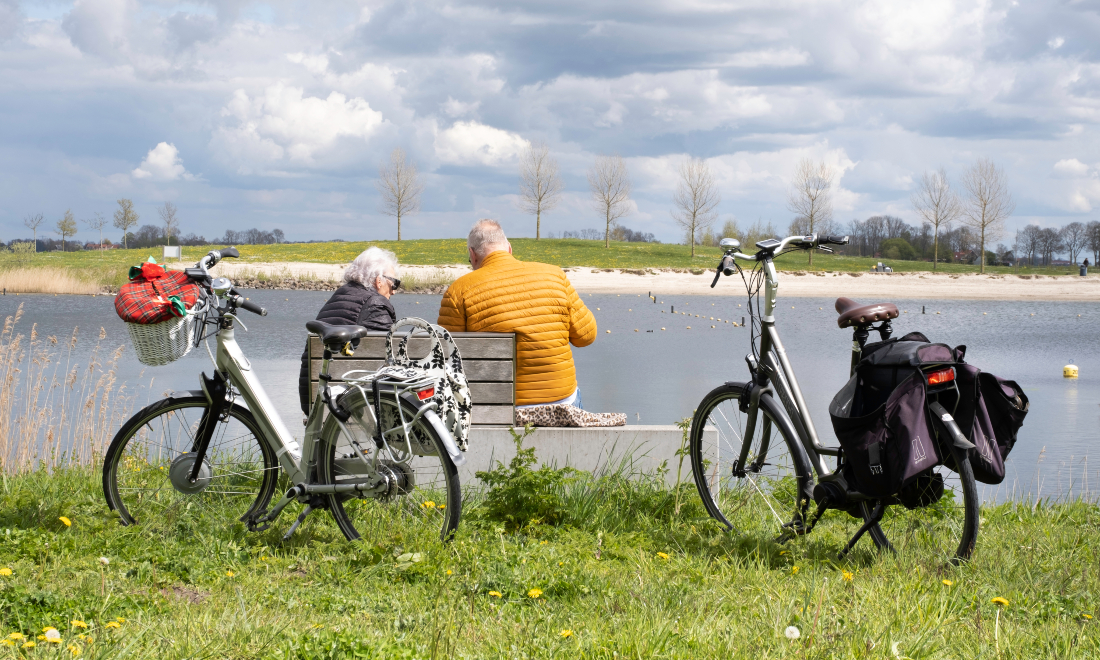 Elderly retired couple on a bike trip in the Netherlands