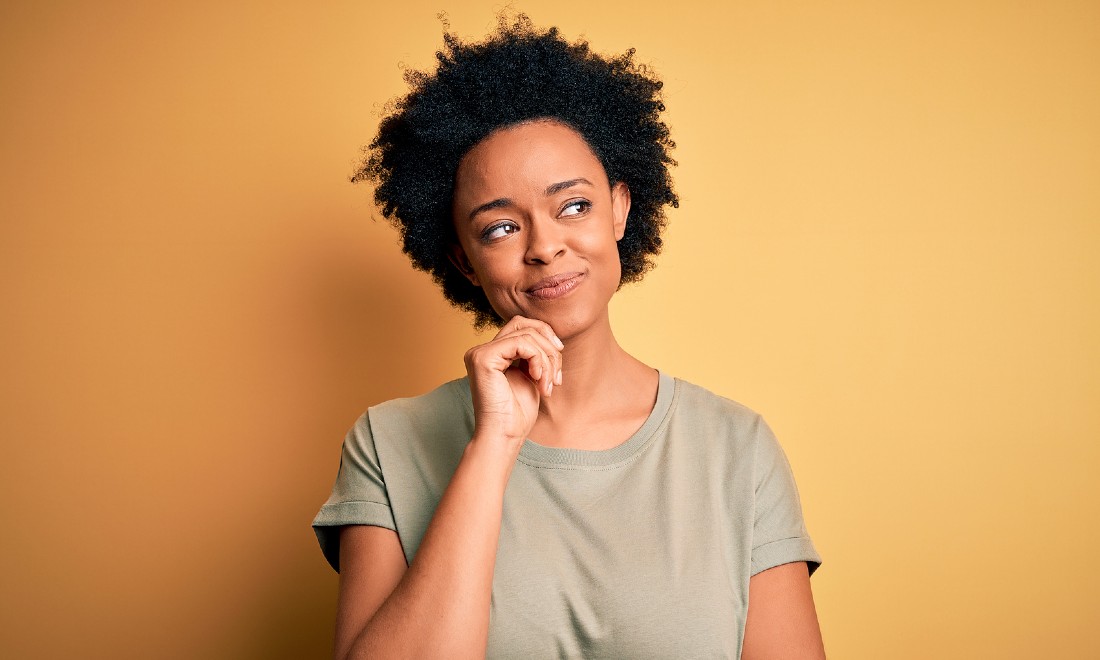 woman thinking, looking pensive