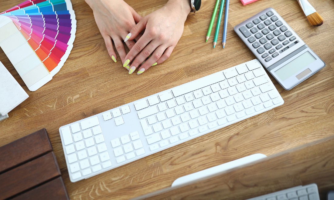 desk with calculator,colour samples,costs renovation