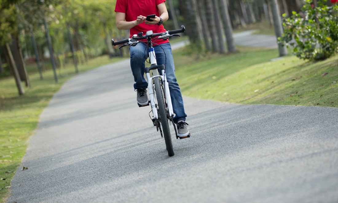 Cyclist using mobile phone