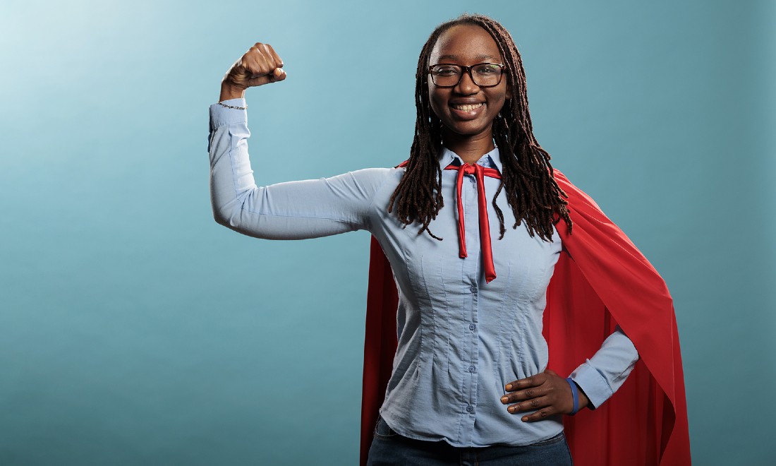 strong woman in a cape 