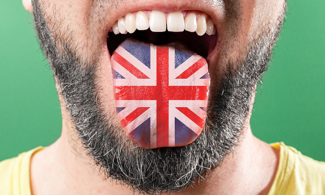 Union Jack flag on man's tongue