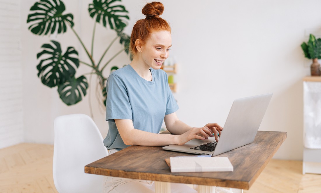 woman working on laptop at home