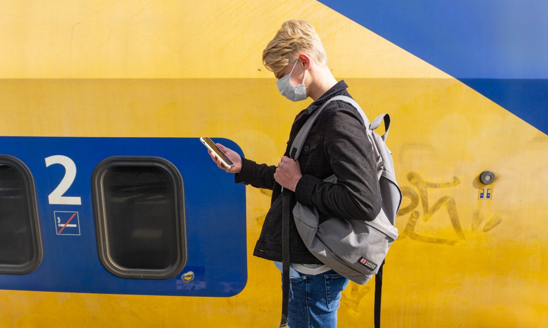 Guy face mask train coronavirus the Netherlands