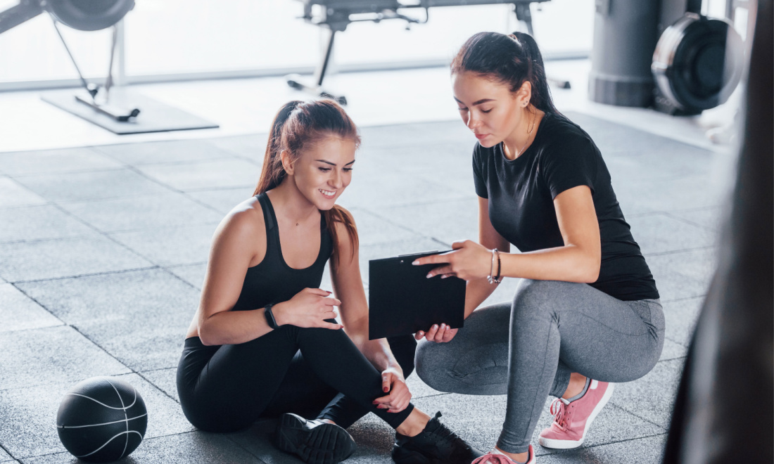 female fitness trainer teaching