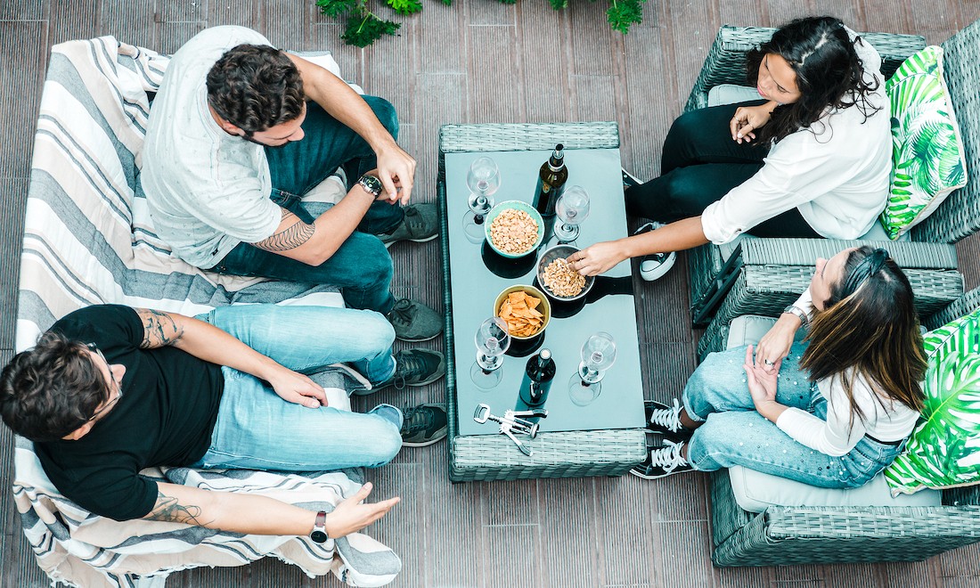 Friends sitting outside talking