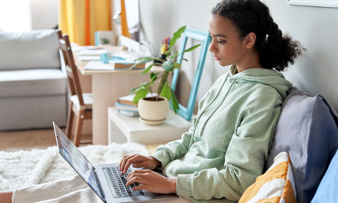 Girl laptop working studying relaxing bed