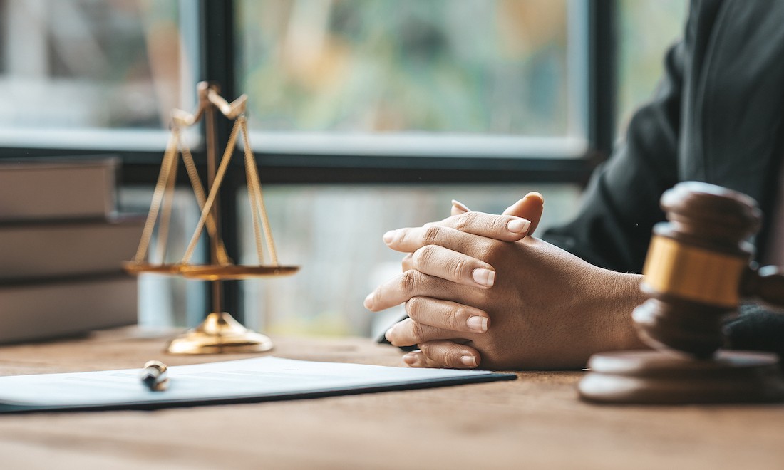 Lawyer sitting at desk