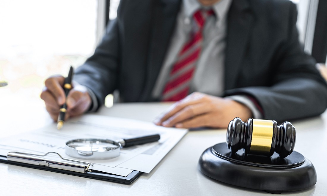 Lawyer with papers and gavel