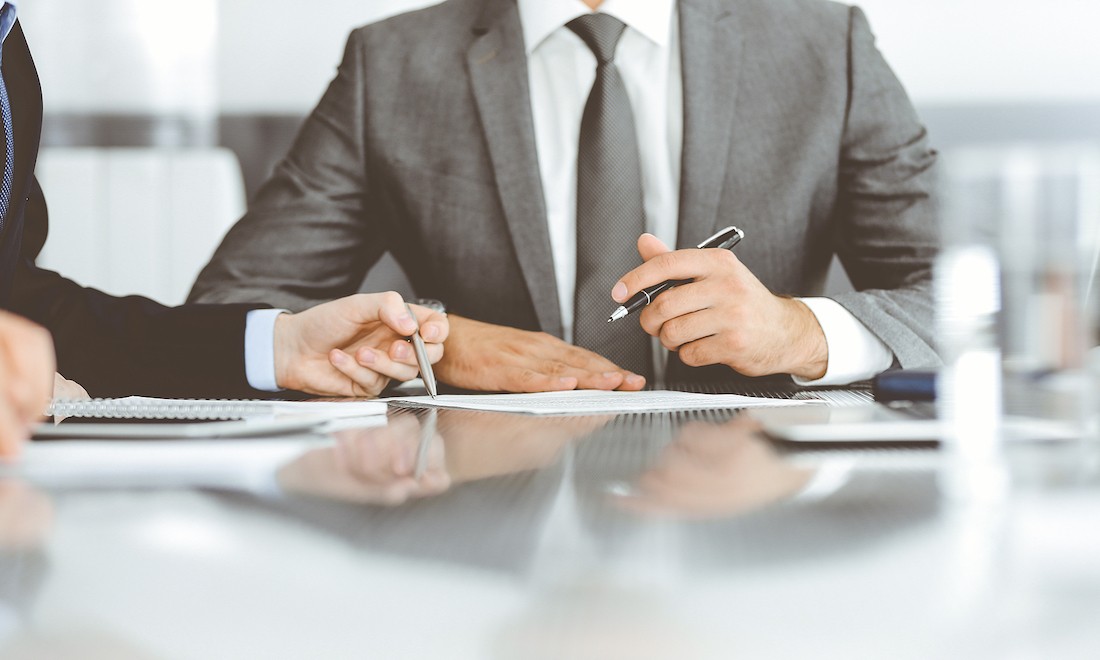 Lawyers working together in office