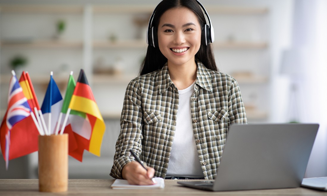 woman on laptop learning new language