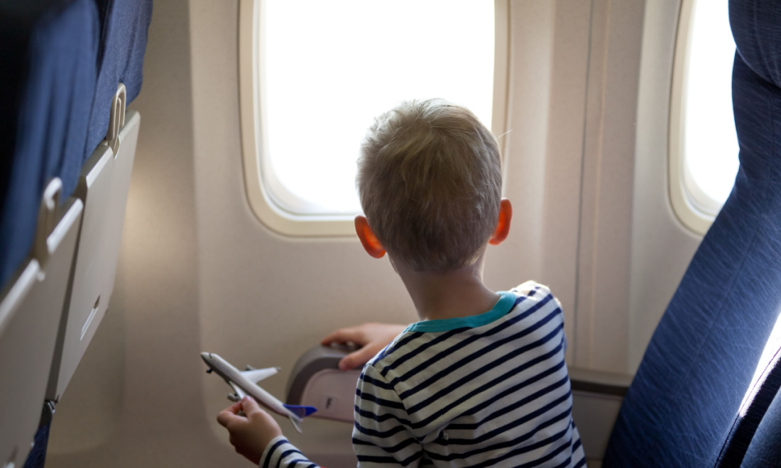 child in airplane