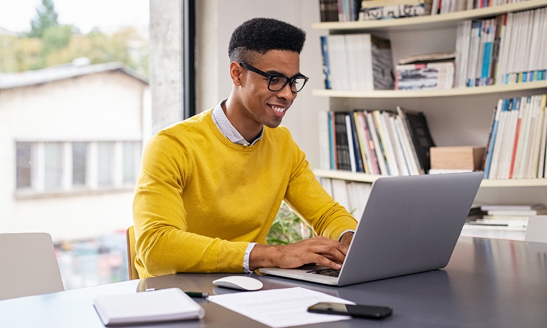 man working from home on laptop