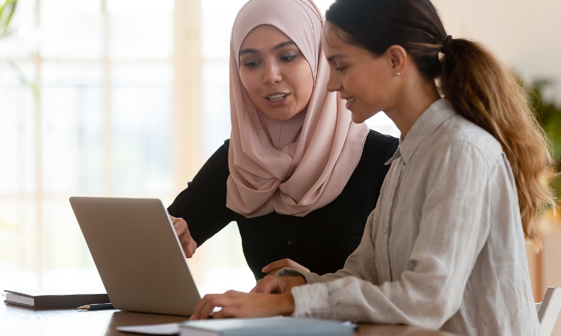 a woman mentoring another woman