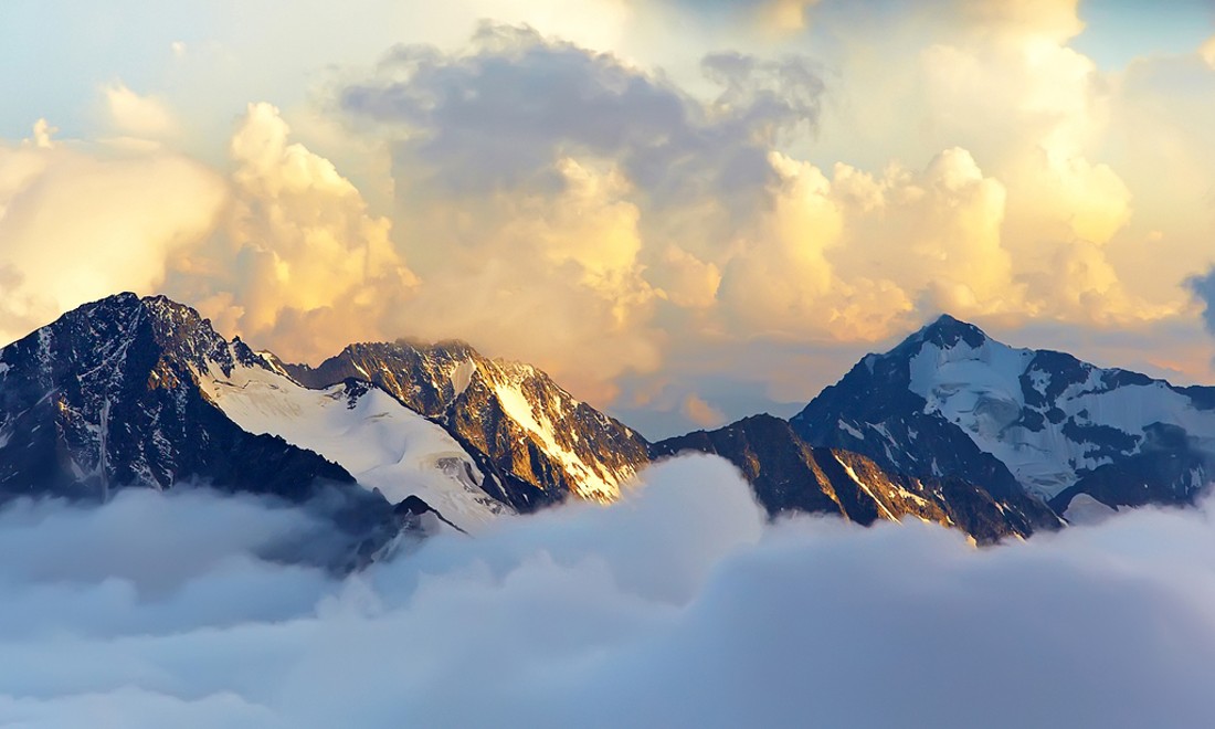 Mountains Alps snow sun clouds