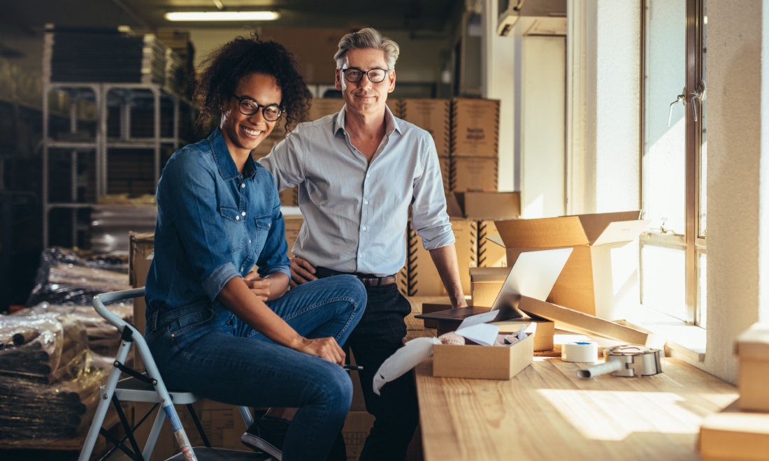 couple smiling at camera - mister mortgage: Breaking down mortgage barriers for the self-employed