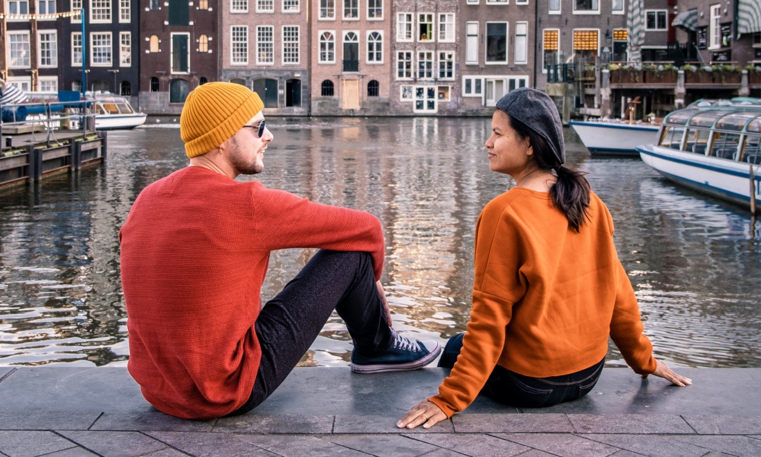 Couple in Amsterdam, Naturalisation in the Netherlands as the partner of a Dutch citizen - Everaert Advocaten