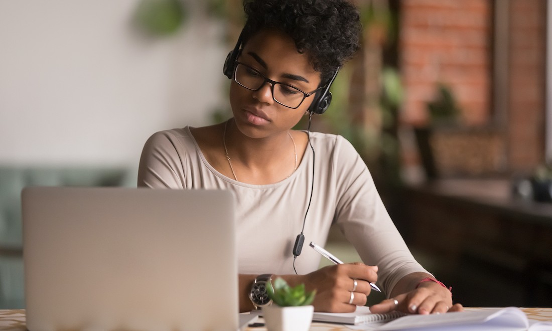 Woman attending online language class