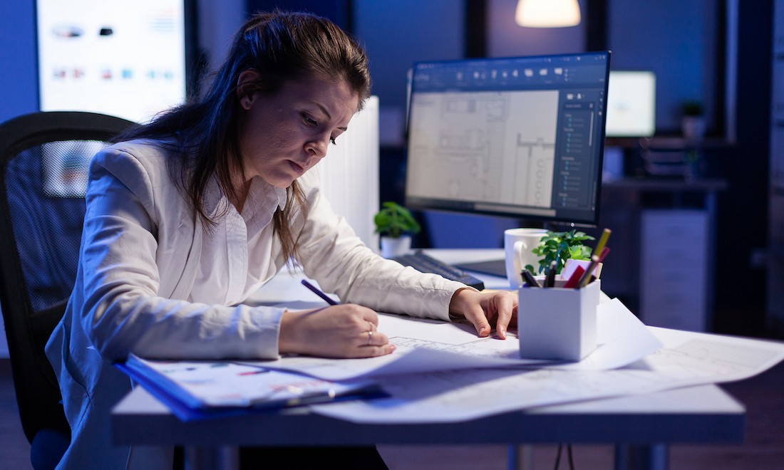 Woman working overtime at night