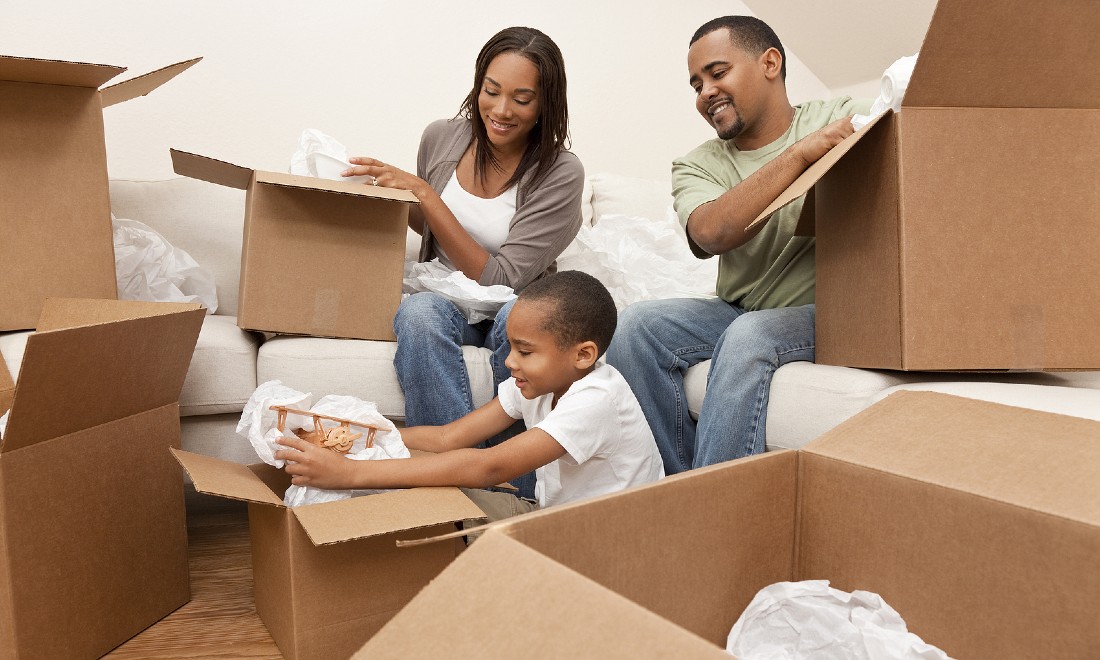 family packing boxes - professional moving company