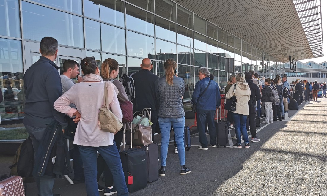 Security queues chaos delays missed flight Schiphol Airport the Netherlands