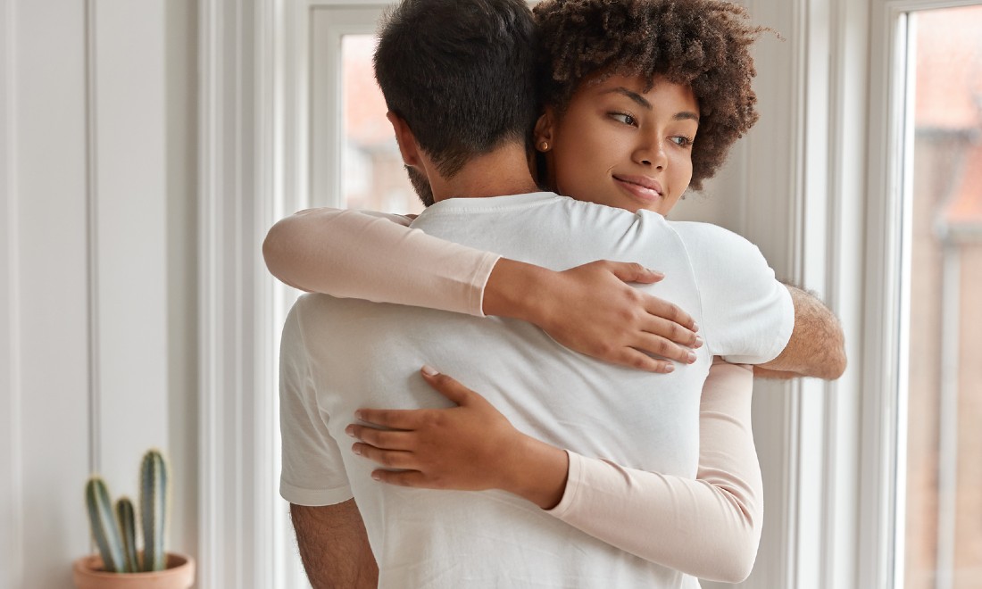 woman and man hugging