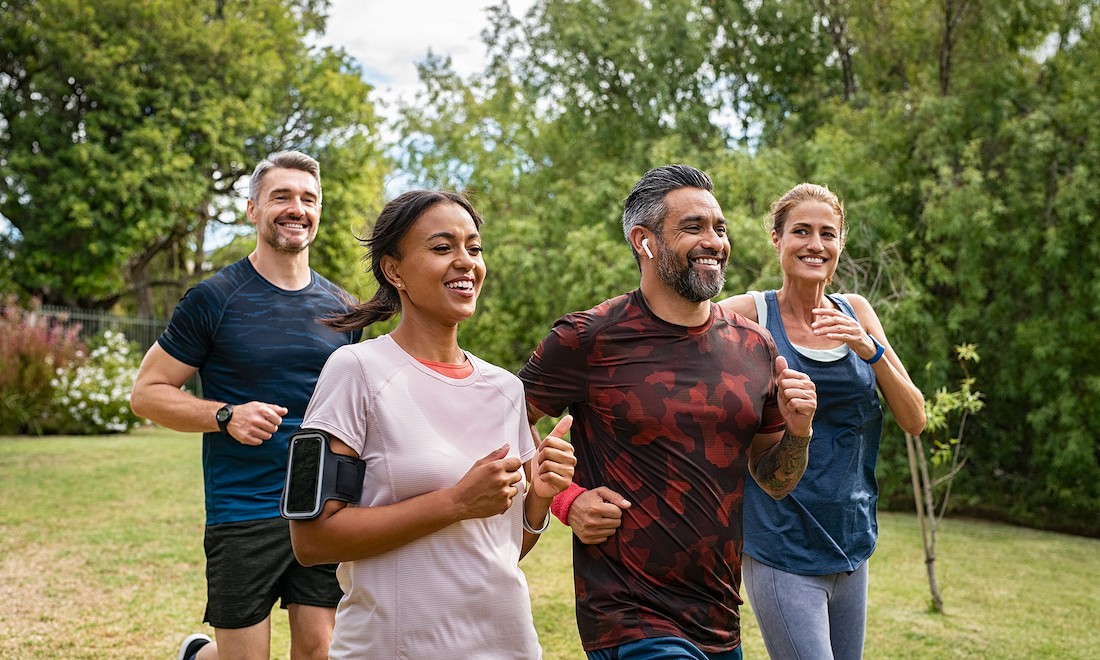 Group of people running together