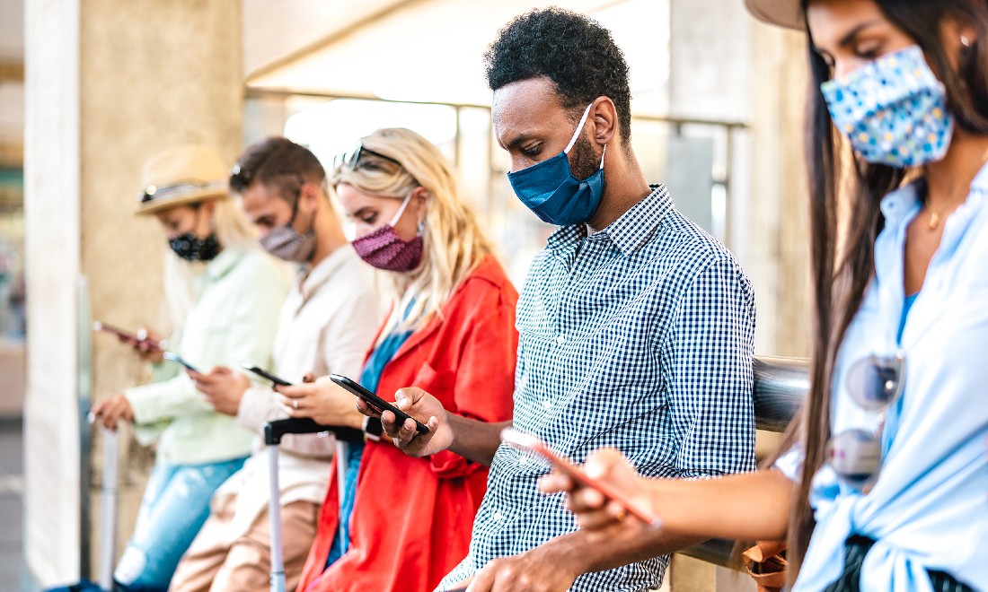 group people all on smartphones