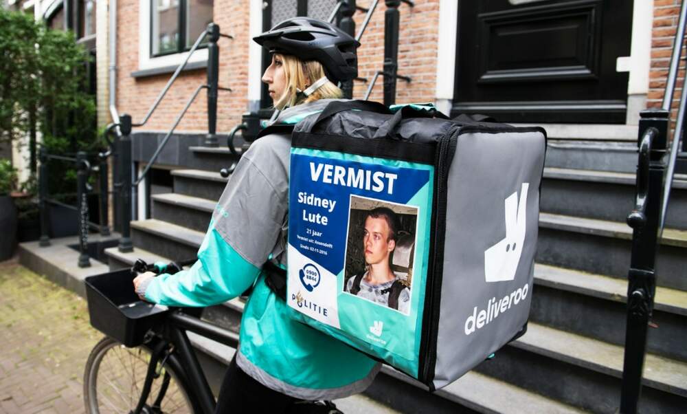 Dutch fast food delivery drivers display missing persons posters