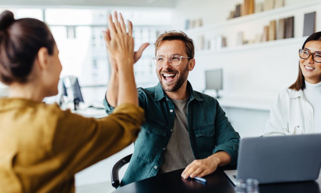 Taxsavers colleagues high fiving