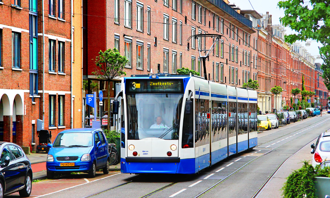 Tram and cars in Amsterdam, the Netherlands