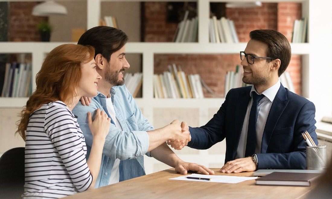 couple buying house getting mortgage