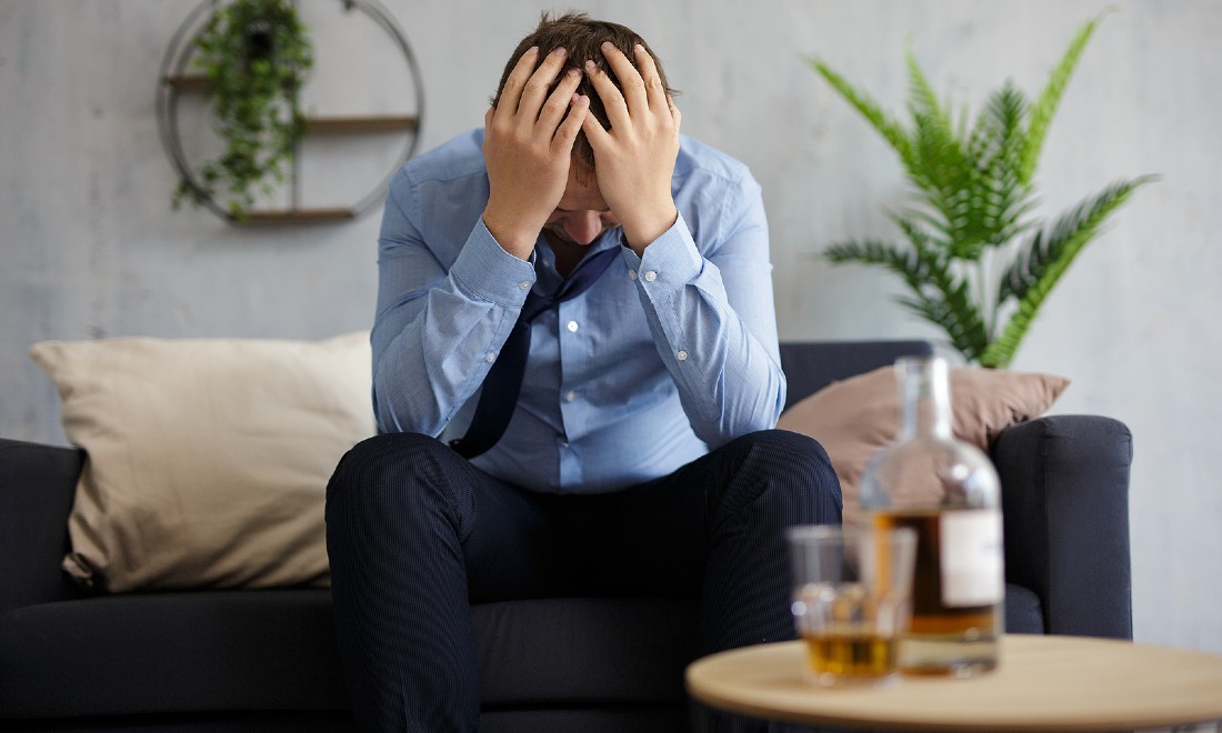 depressed man on couch