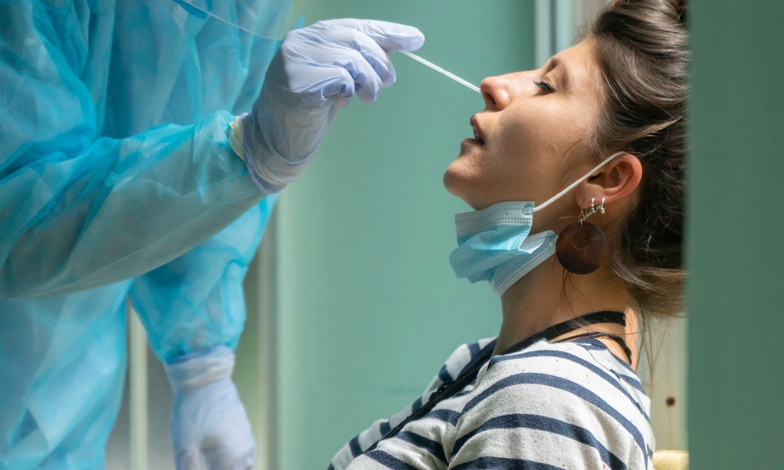 woman being swabbed for covid test