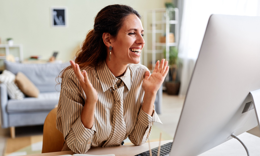 woman smiling on a business call