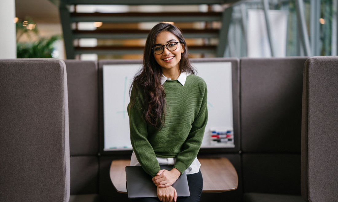 woman smiling with glasses mba