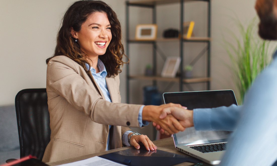 AZ Legal woman in suit shaking hands